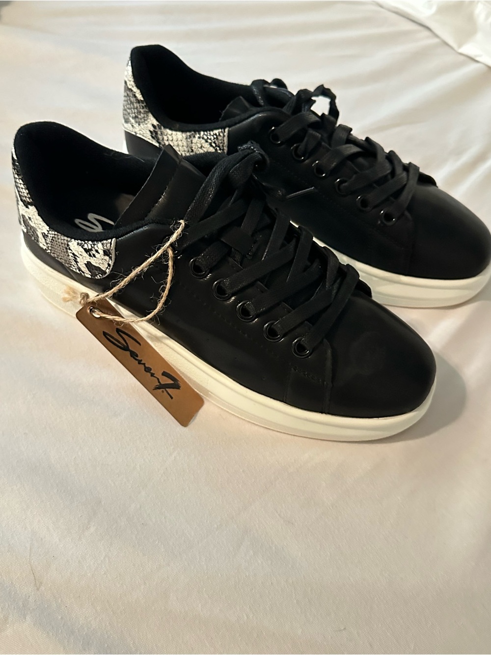 Seven7 Black Low-Top Sneakers with White Sole